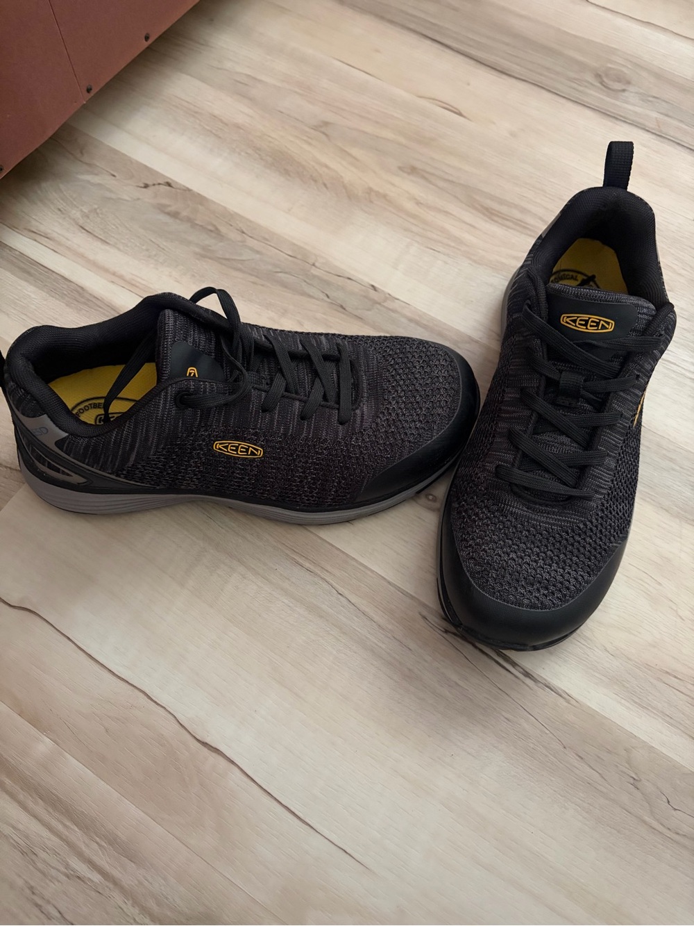 Keen Men’s Black and Yellow Knit Lace-Up Steel Toed Sneakers